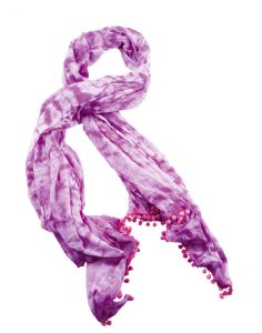Purple tie dye neckerchief with pom poms isolated on white background. Clipping path included